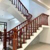cầu thang nhôm vân gỗ lim